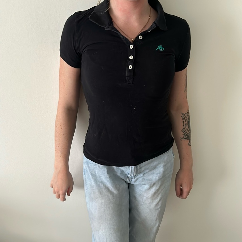 Black polo shirt